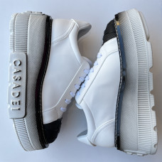 Білі шкіряні кеди на високій чорній платформі Casadei 