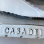 Білі шкіряні кеди на високій чорній платформі Casadei 