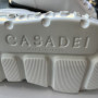 Білі шкіряні кеди на високій чорній платформі Casadei 
